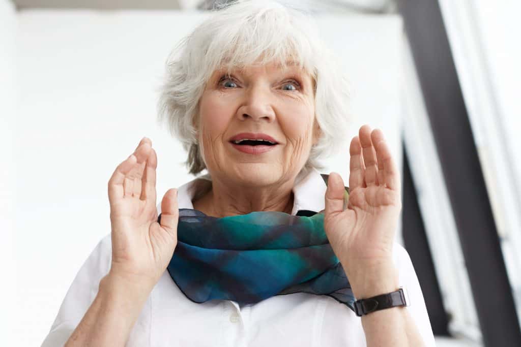 Human facial expressions, emotions, feelings and reaction. Picture of emotional elegant middle aged Caucasian lady in stylish clothes having amazed surprised look, receiving unexpected news